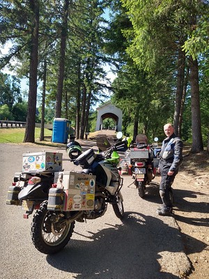 Stefan and our motorcycles in front of a covered bridge in Oregon